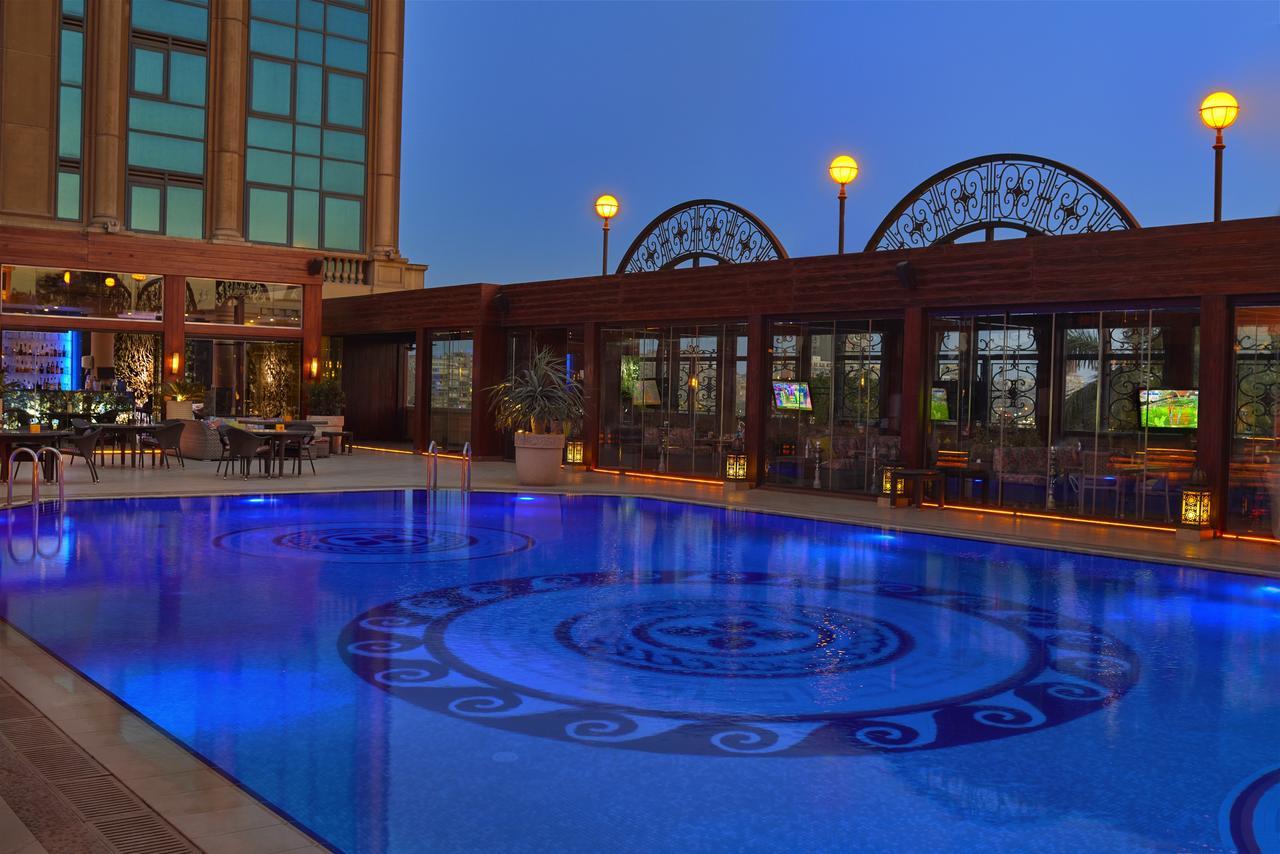 Four Seasons Cairo At The First Residence Giza Zewnętrze zdjęcie The pool at the hotel